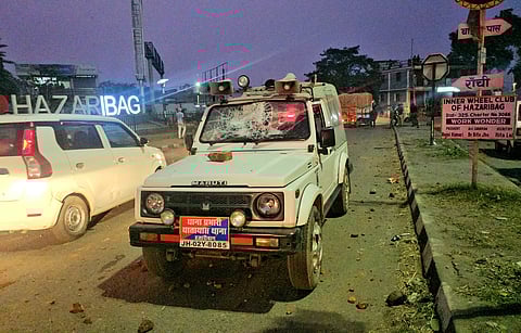 A police vehicle damaged during the confrontation