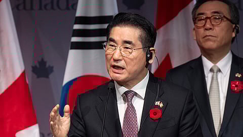 FILE - South Korea's Foreign Minister Cho Tae-yul, right, looks on as South Korea's Defense Minister Kim Yong Hyun speaks during a news conference in Ottawa, Ontario, on Nov. 1, 2024.
