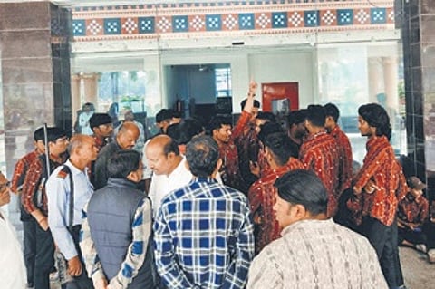 Students staging protest in front of the administrative building of GMU