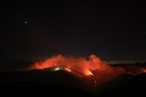 Smoke from the Franklin Fire billows into the air in Malibu, California, on December 10, 2024.