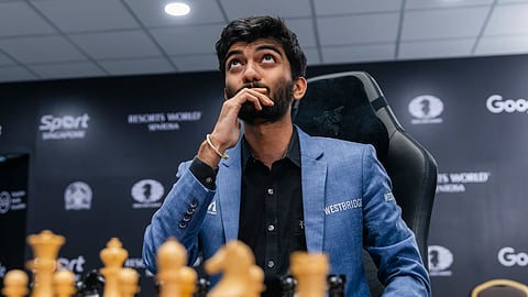 India's D Gukesh reacts after beating title-holder China's Ding Liren in the 14th and last game of the FIDE World Chess Championship 2024 in Singapore, Thursday, Dec. 12, 2024.