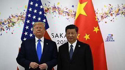 Chinese President Xi Jinping (R) and then- US President Donald Trump attend their bilateral meeting on the sidelines of the G20 Summit in Osaka on June 29, 2019.