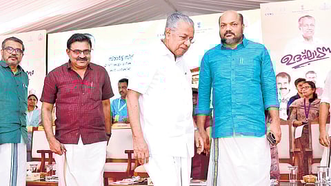 Chief Minister Pinarayi Vijayan leaves the stage after inaugurating the new Ernakulam market complex on Saturday