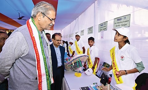Singh Deo interacting with a student at the function.