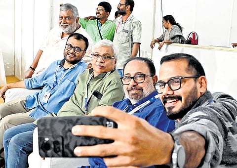 Journalist Baiju Chandran, filmmakers Kamal and Sibi Malayil, along with Assistant Conservator of Forests and filmmaker Prabhu P M taking a selfie during the 29th IFFK in Thiruvananthapuram on Saturday