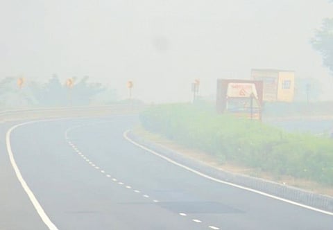 National Highway 44 enveloped in fog in Adilabad on Sunday.