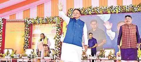 Chief Minister Mohan Charan Majhi waving at the crowd on Sunday