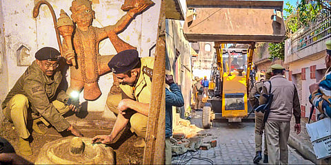 Security personnel inside a temple that was reopened after 46 years, at Khaggu Sarai area in Sambhal district, Saturday, Dec. 14, 2024.