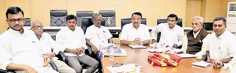 Karnataka Border Area Development Authority Chairman Somanna Bevinmarad addresses the media in Belagavi on Monday