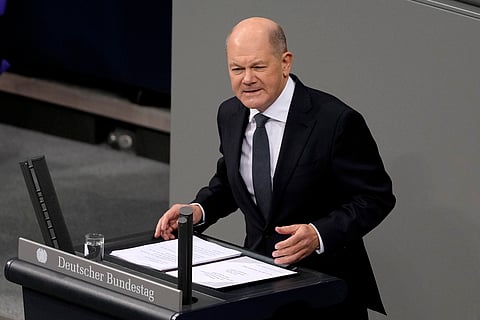 German Chancellor Olaf Scholz speaks during a plenary session at the German parliament Bundestag where he faced a vote of confidence (Photo | AP)