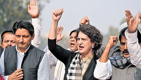Congress leaders Deepender Hooda, Priyanka Gandhi Vadra and KC Venugopal take part in a protest in the Parliament House Complex, in New Delhi on Monday.