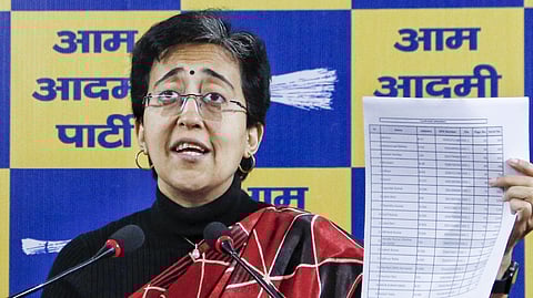 Delhi Chief Minister Atishi addresses a press conference at the party office in New Delhi on Monday, Dec. 16, 2024.