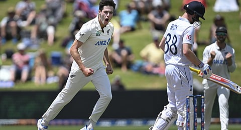 New Zealand bowler Will O'Rourke celebrates the dismissal of England's Harry Brook, right, during play on day four of the third cricket test between England and New Zealand in Hamilton, New Zealand, Tuesday, Dec. 17, 2024.