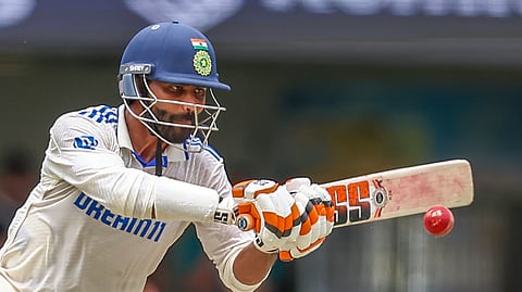 India's Ravindra Jadeja plays a shot during play on day four of the third cricket test between India and Australia at the Gabba in Brisbane.
