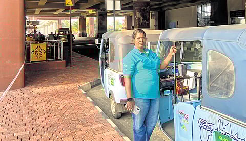 Rani Manikuttan who operates an e-feeder auto from Tripunithura metro station