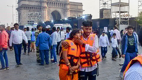 Passengers after being rescued in a joint operation by the Indian Navy and Indian Coast Guard after a ferry capsized off Mumbai coast.