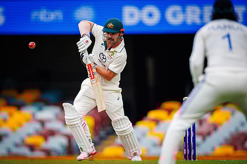 Australia's Travis Head plays a shot on day five of the third cricket Test match between Australia and India at The Gabba in Brisbane on December 18, 2024.