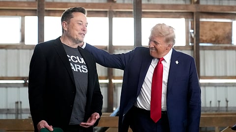 Tesla and SpaceX CEO Elon Musk, left, and President Donald Trump