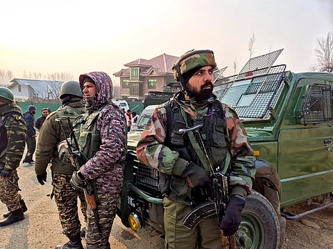 Security forces personnel during an encounter with terrorists at Kadder in the Behibagh area of Kulgam district, J & K on Thursday