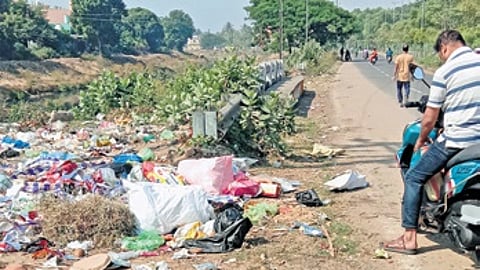 Garbage lying dumped on the roadside at Petanala in CDA locality