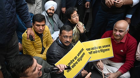 Delhi Chief Minister Atishi with AAP National Convener Arvind Kejriwal and party leaders Manish Sisodia and Sanjay Singh during a protest against Union Home Minister Amit Shah regarding his remarks on B R Ambedkar in the Parliament, in New Delhi on Wednesday, Dec. 18, 2024.