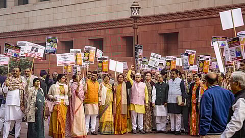 BJP MPs stage a protest alleging insult of Dr BR Ambedkar by the Congress party, at Parliament complex, in New Delhi.