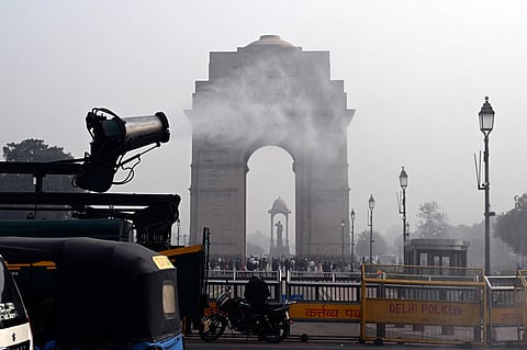An Anti Smog Truck seen sprinkling water over the street to settle down dust particles amid pollution on December 19, 2024.