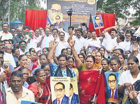 DMK cadres protest against Amit Shah for his alleged derogatory comments on BR Ambedkar at Valluvarkottam on Thursday