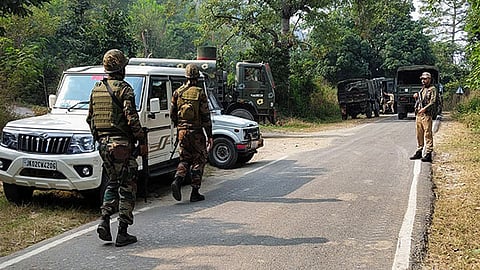 A security official said an exchange of gunfire was going on between troops and the holed militants.