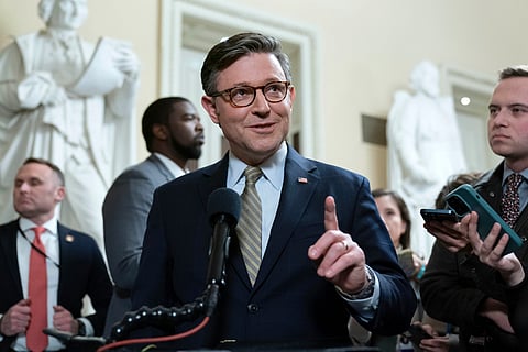Speaker of the House Mike Johnson, R-La., talks to reporters after passing the funding bill to avert the government shutdown at the Capitol in Washington, Friday