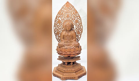 Buddha wood carving idol carved by Pasari Shakuntala