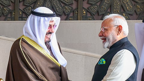 Prime Minister Narendra Modi being greeted by Prime Minister of Kuwait Sheikh Ahmed Abdullah Al-Ahmad Al-Sabah during the former's ceremonial welcome and Guard of Honour in Kuwait.
