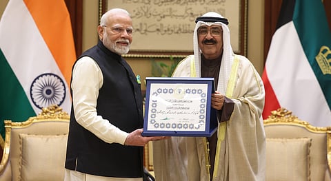 Prime Minister Narendra Modi being conferred with Kuwait's highest honour 'The Order of Mubarak Al Kabeer' by Amir of Kuwait Sheikh Meshal Al-Ahmad Al-Jaber Al Sabah, in Kuwait.