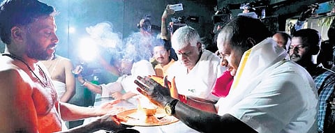 Union Minister for Steel and Major Industries H D Kumaraswamy offers pooja to Lord Deveshwara in Haradanahalli of Holenarasipur taluk on Monday