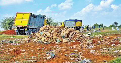 The trucks carrying the waste back to Kerala