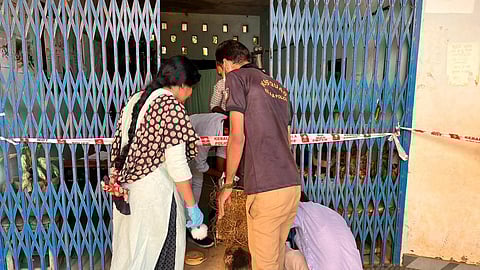 Police inspect the site on Monday.