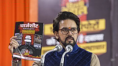 File Photo | BJP MP Anurag Thakur addresses the gathering during the release of a chargesheet against Aam Aadmi Party National Convener Arvind Kejriwal