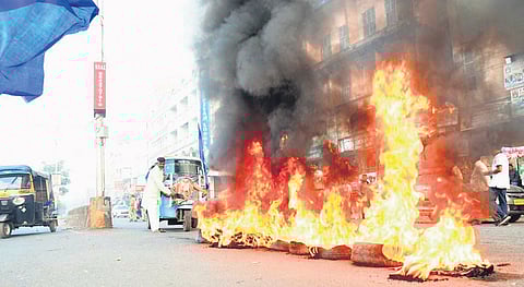 Protesters set tyres on fire during the Kalaburagi bandh called by Dalit organisations on Tuesday.
