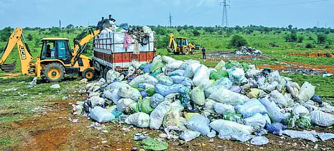 Medical and other waste that was illegally dumped at Tirunelveli in Tamil Nadu being removed by authorities from Kerala