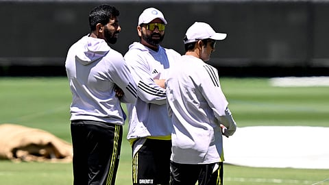 Skipper Rohit Sharma (centre) at the MCG with Jasprit Bumrah (left) and coach Gautam Gambhir (right)