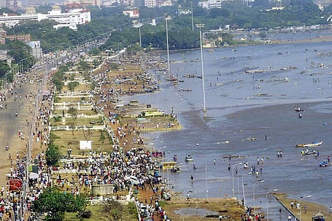 In this photo dated Dec. 26, 2004, an aerial view of the Marina beach following the massive earthquake in Indonesia triggering tsunami waves and flooding parts of coastal India, in Chennai.
