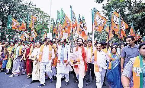 Telangana BJP leaders take part in a rally organised as part of the birth centenary celebrations of former prime minister Atal Bihari Vajpayee, in Hyderabad on Wednesday