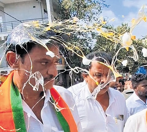 RR Nagar BJP MLA Munirathna after an egg was thrown at him in Bengaluru on Wednesday