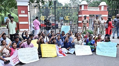 Members of SFI stage a demonstration at the Anna University gate after a student was raped inside the campus.