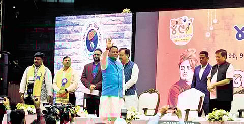 CM Mohan Majhi waves to the gathering at the ABVP conference in Jawaharlal Nehru Indoor Stadium at Cuttack on Thursday.