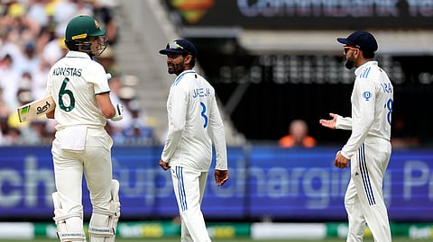 India's Virat Kohli (R) in an altercation with Australia's debutant Virat Kohli on the fourth cricket test match between Australia and India at the MCG in Melbourne.