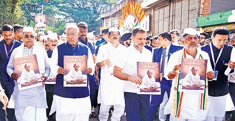 AICC president Mallikarjun Kharge, Leader of Opposition in the Lok Sabha Rahul Gandhi, Chief Minister Siddaramaiah, and Deputy Chief Minister DK Shivakumar hold posters of Mahatma Gandhi and march during the 1924 Congress Session’s centenary celebrations