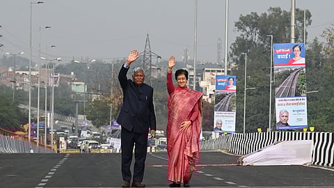 CM Atishi along with Assembly Speaker Ram Niwas Goel at flyover inauguration in Anand Vihar on Wednesday.