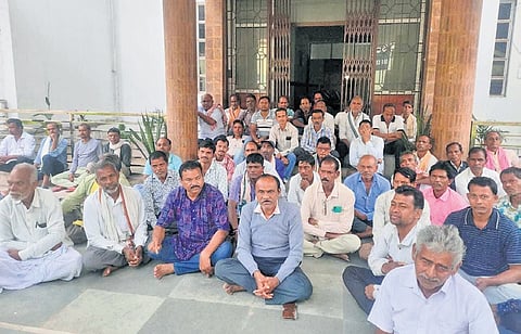 Farmers staging dharna at the collector’s office in Bargarh on Friday