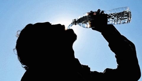 Drink water, but not in excess, doctors warn